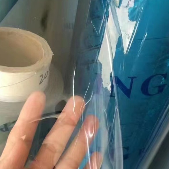 Films transparents en PVC, divers films en PVC pour emballage de sacs à main Films transparents pour emballage de vêtements neufs et anciens